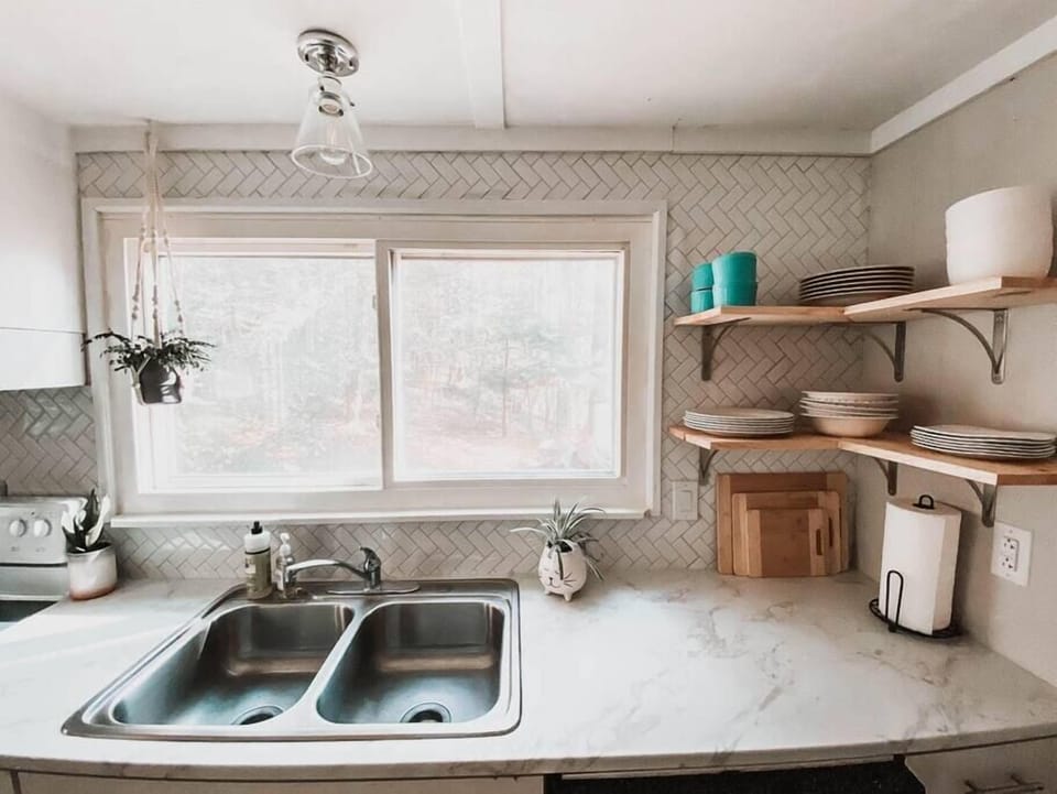Open shelves with all the dishes you need for any meal.
