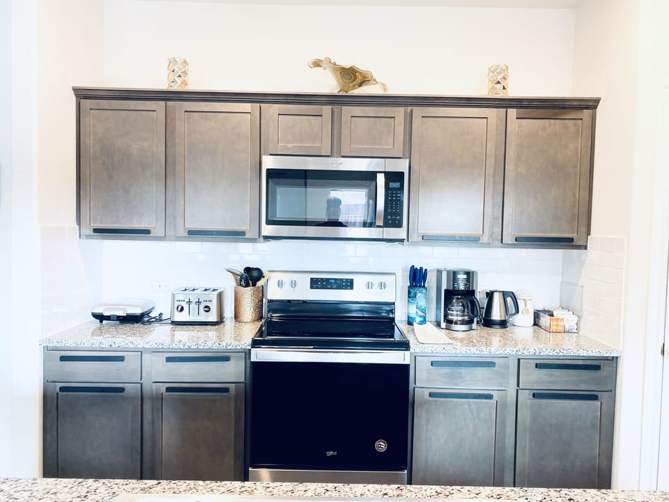 Walk-in pantry. LOTS of pots/pans/appliances/cooking gadgets. Plastic-wares  too