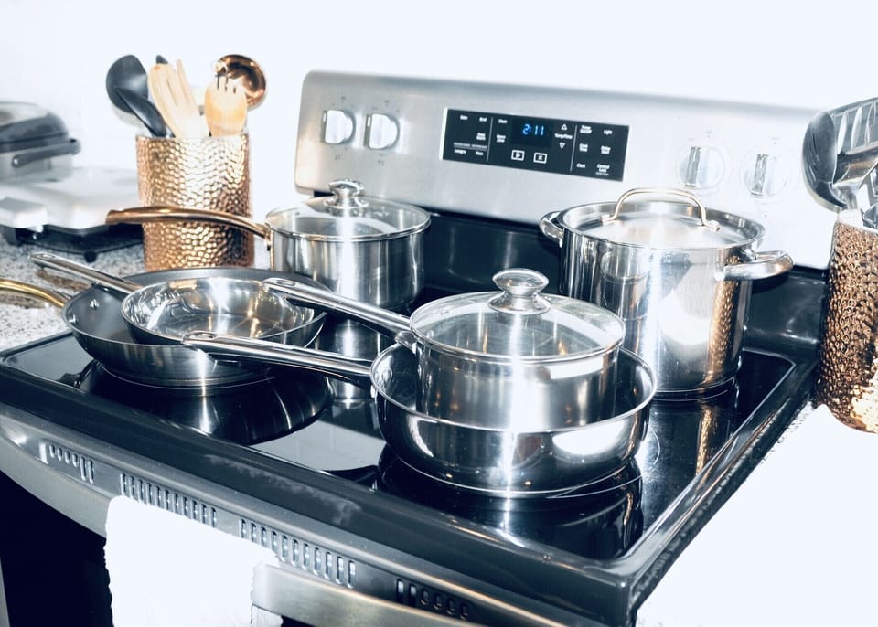 Walk-in pantry. LOTS of pots/pans/appliances/cooking gadgets. Plastic-wares  too
