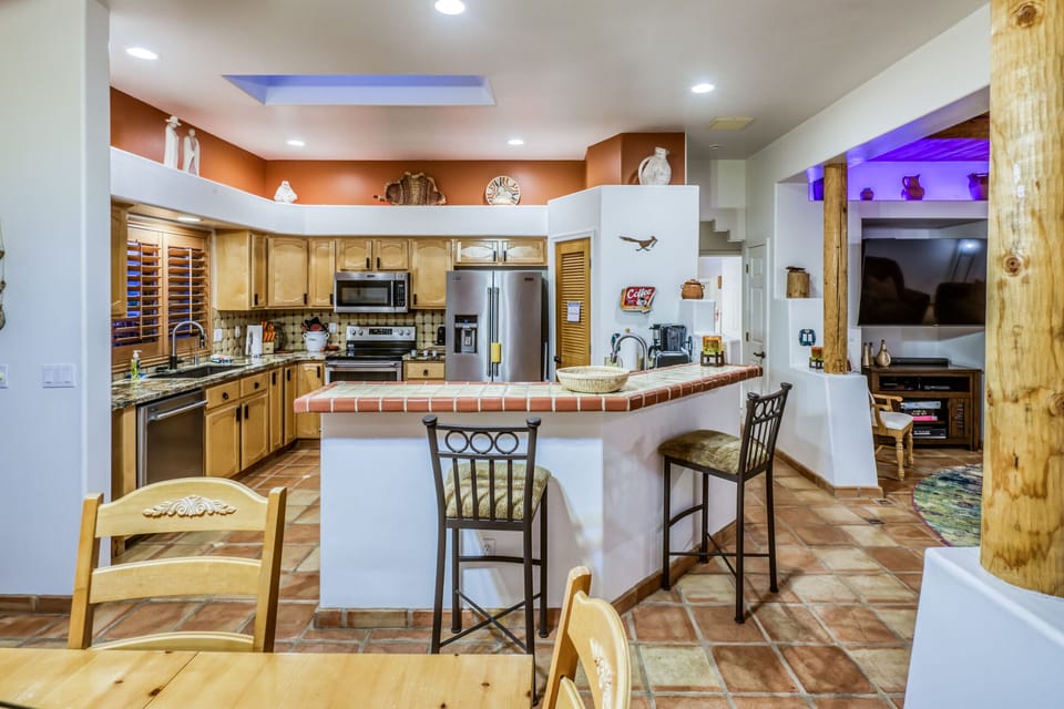 Plenty of counter & prep space, 2 sink areas, and pantry to store away goodies!