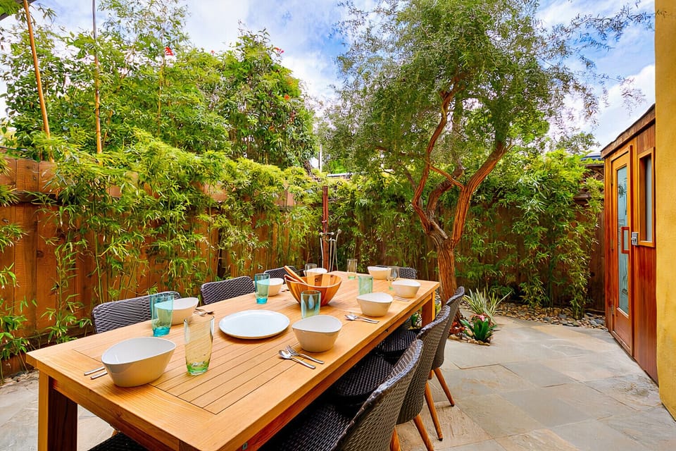 Al-fresco dining on the tranquil, shaded patio. Hummingbirds love it here, too!