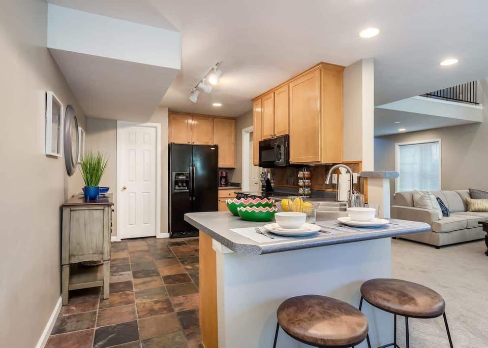 Gorgeous full kitchen with small bar