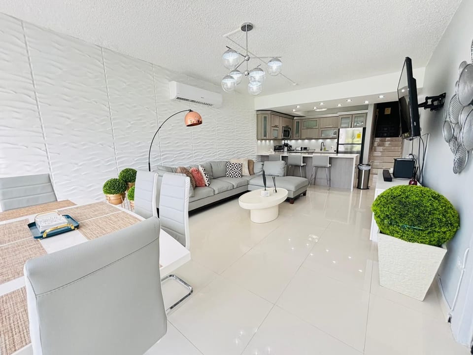Living room. Enjoy relaxing in front of the TV or dining at a stylish table