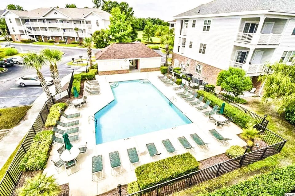 Beautiful pool steps from the condo!