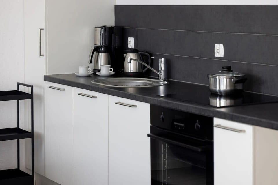 Kitchenette of apartment Armii Krajowej 5/44 with oven