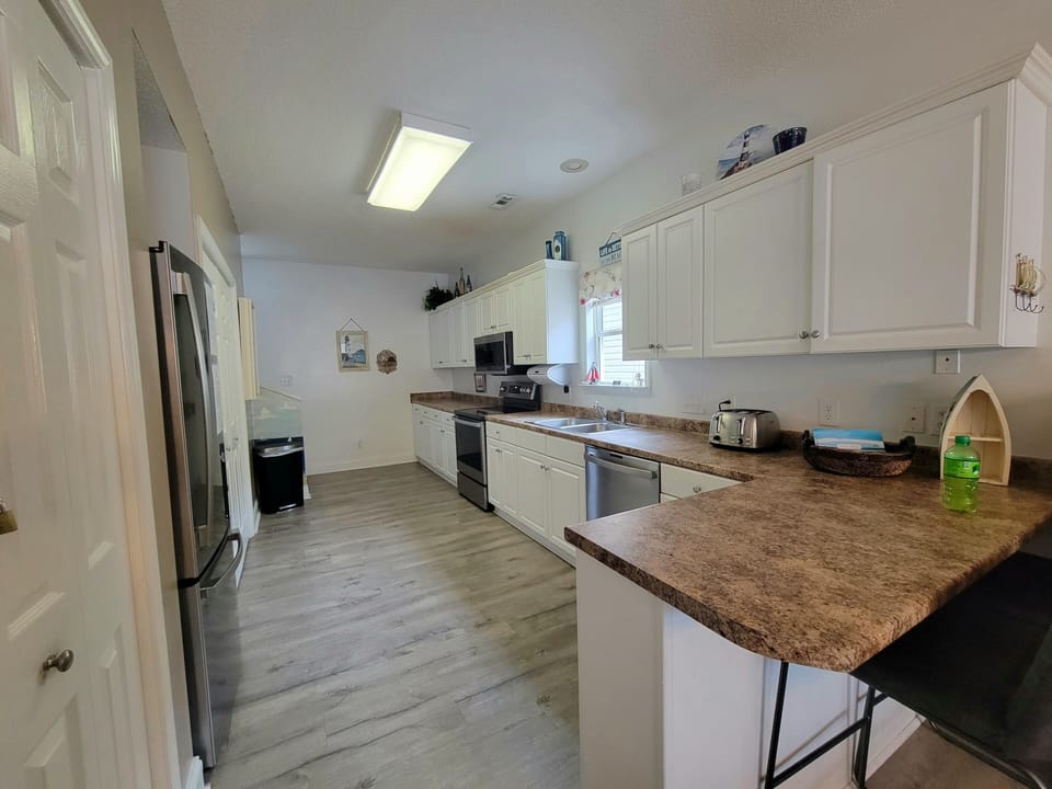 It's a big kitchen... and brand new GE Profile level kitchen appliances.  Yowza!