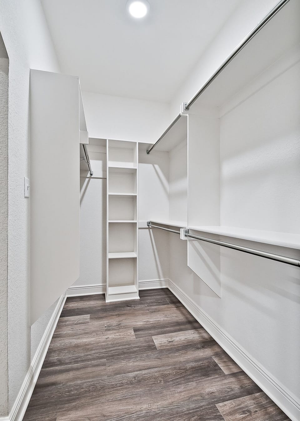 Closet in Main Bedroom that connects to laundry room