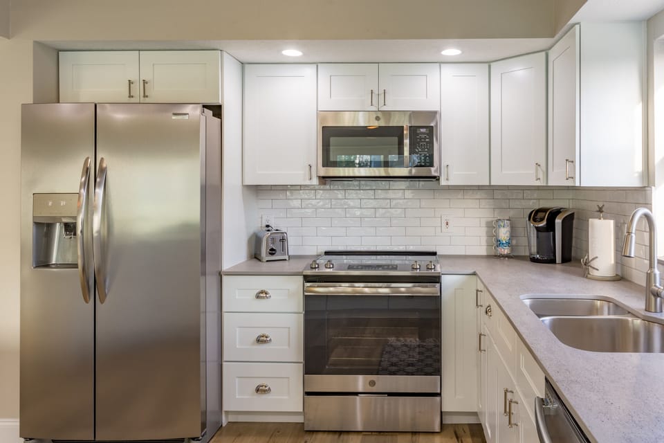Beautifully updated kitchen with stainless appliances and all the essentials