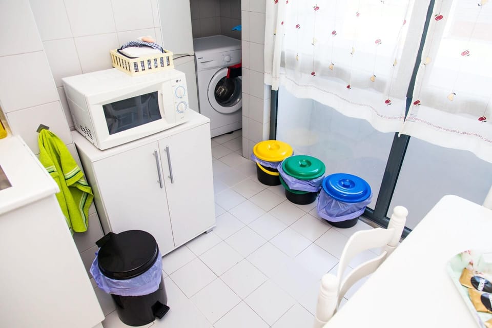Microwave, recycling bins