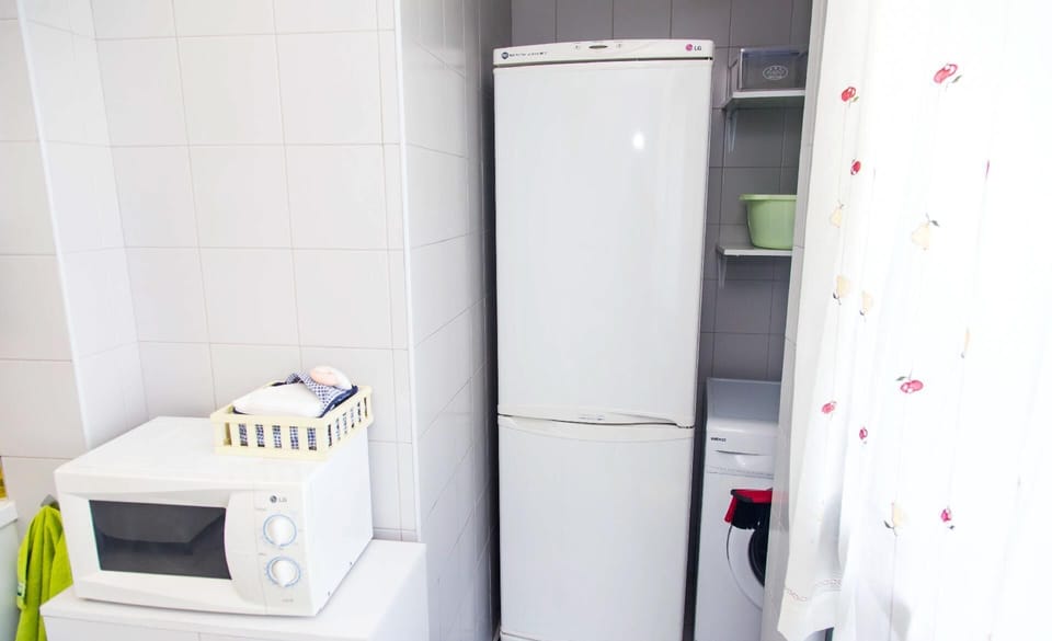 Refrigerator with freezer; clothes washing machine.