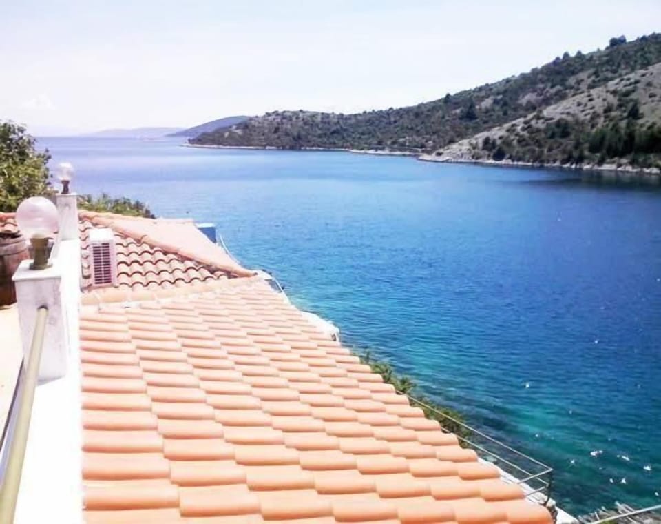 View on the open sea from terrace, two meters from sea