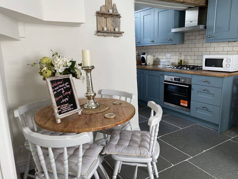 Farmhouse dining table to enjoy mealtimes.