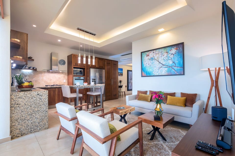 Living room and open kitchen and 4K Smart TV. Also fastest internet available.
