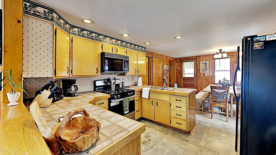 Kitchen- Everything you need to cook and serve meals to your hungry guests