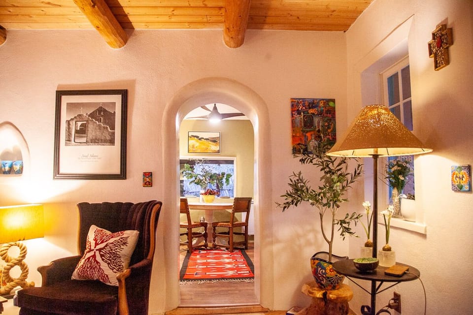 View from living room into kitchen. Original arched doorway w/ 18-inch walls.
