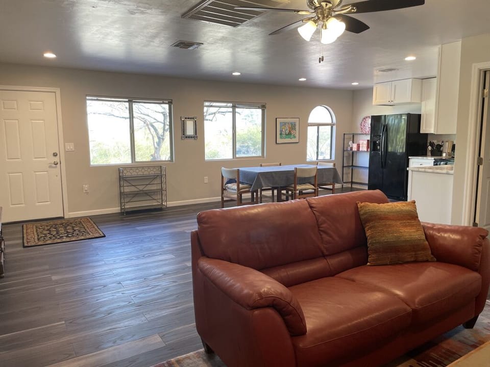looking from living room to front door and dining area.