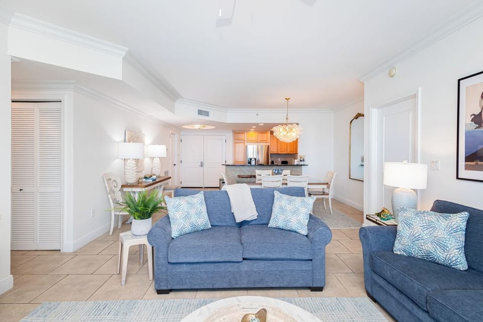 Settle into your coastal-inspired living space, where soft blues and warm lighting invite you to unwind after a day of adventure. Fresh, open, and thoughtfully designed—it's the perfect retreat.