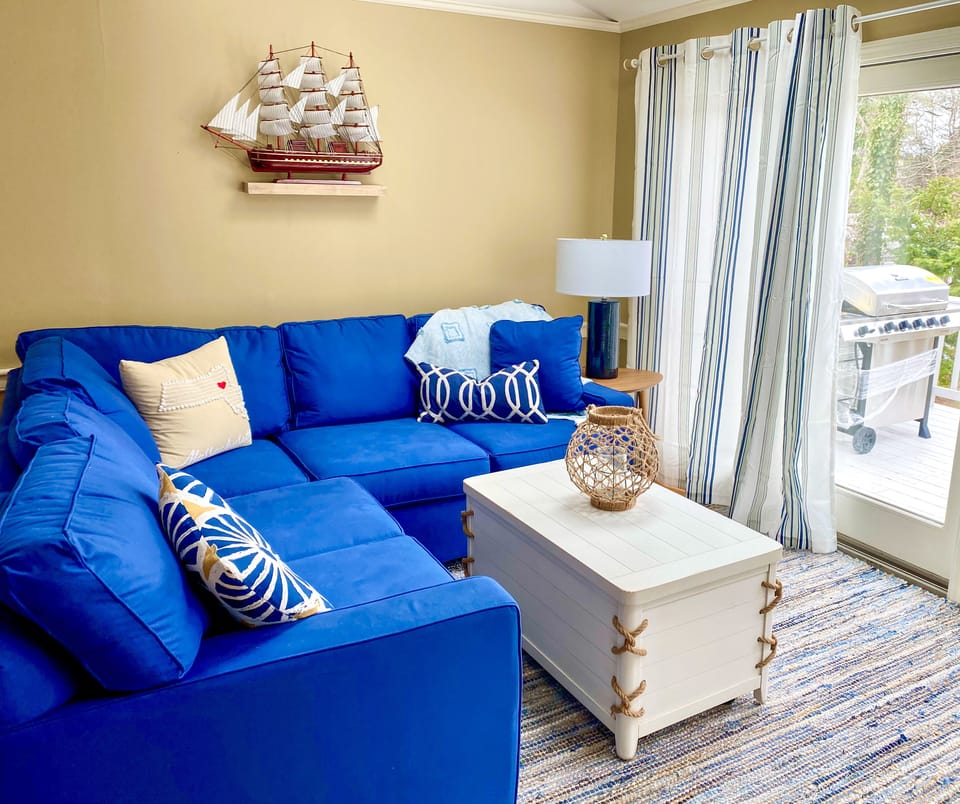 Family room with sliders to deck, new smart TV