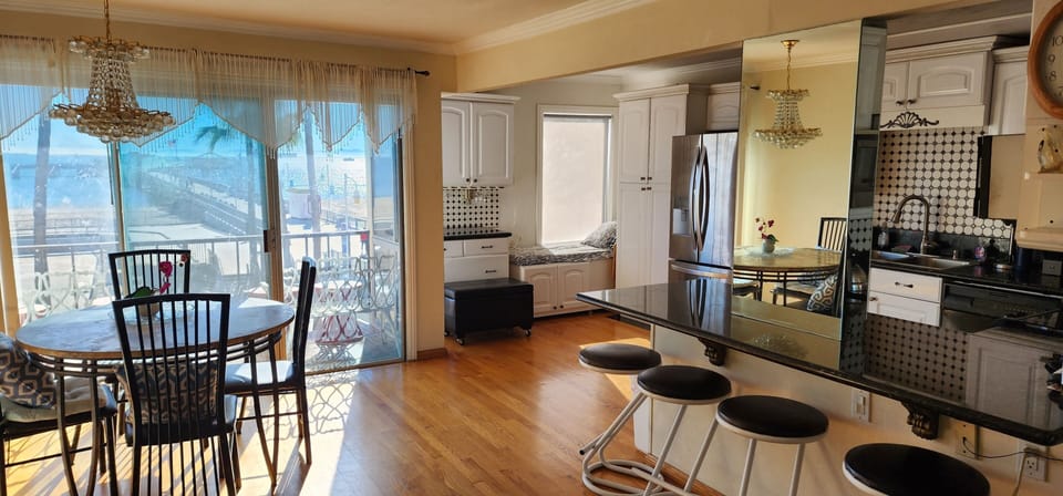 Open Layout from the dining area, kitchen, bar, and living room.