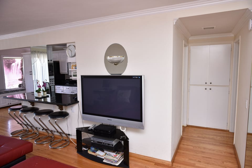 hallway towards bathroom and bedroom