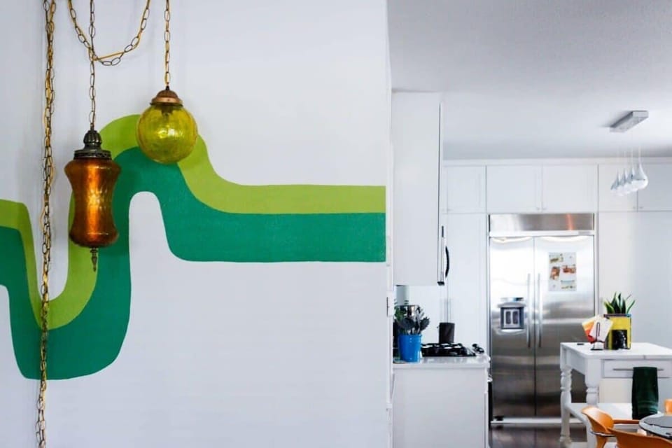 Swag lamps illuminate the space with groovy light patterns.