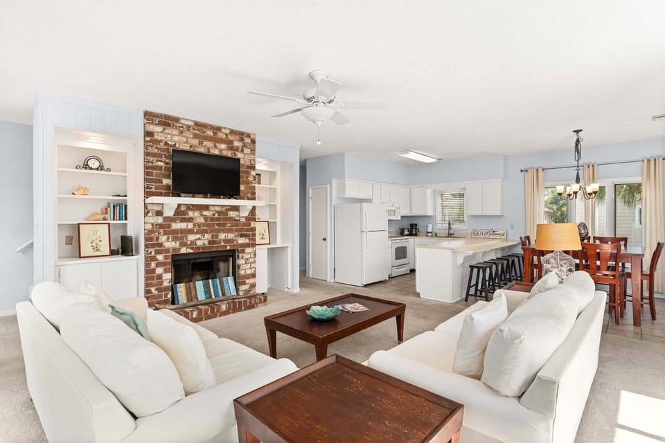 Spacious coastal living room with comfortable seating