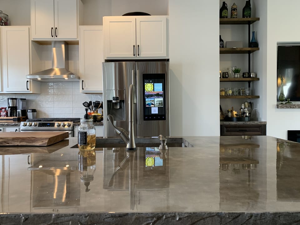 Concrete counters with smart appliances.