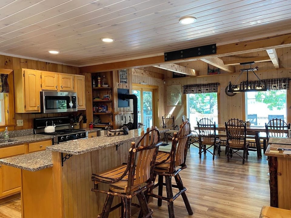 Open concept kitchen/dining area with plenty of seating
