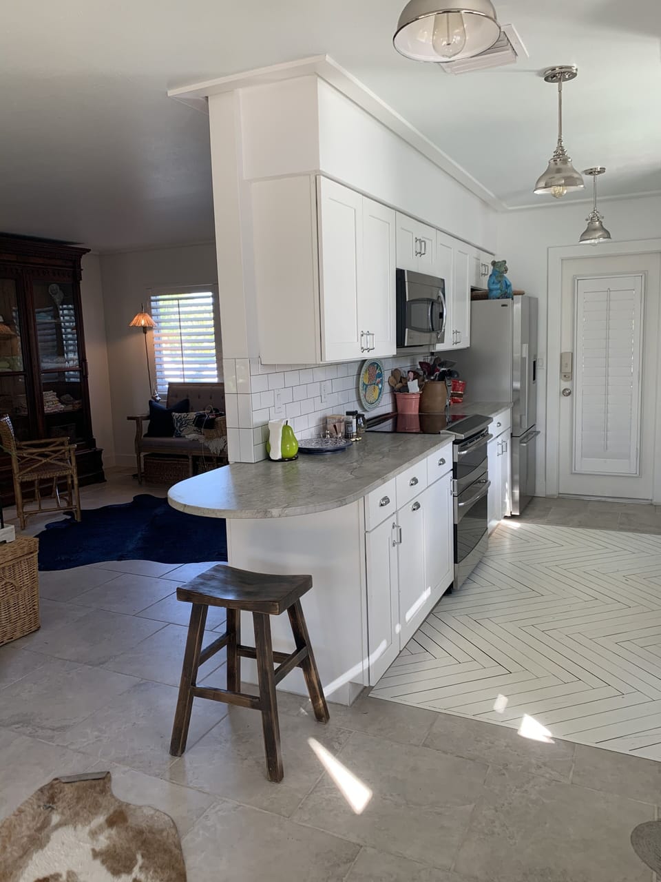 Galley Kitchen allows sous chef a place to sit and assist!