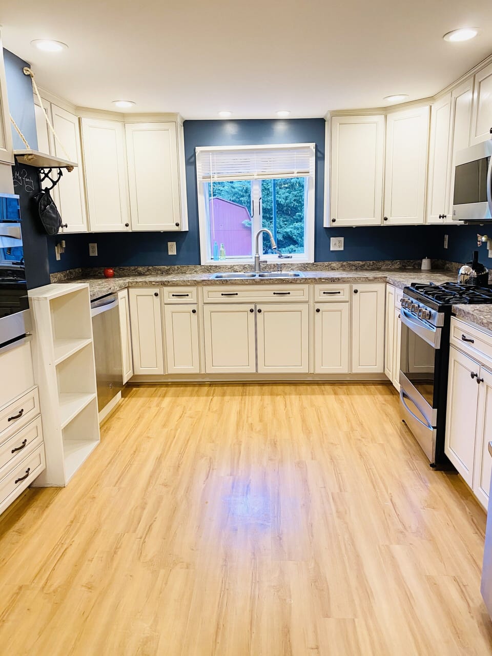 Ample kitchen with all new appliances and stunning cabinetry up to ceiling!