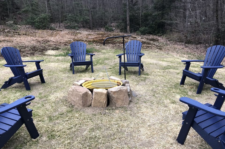 Firepit with swing grill
