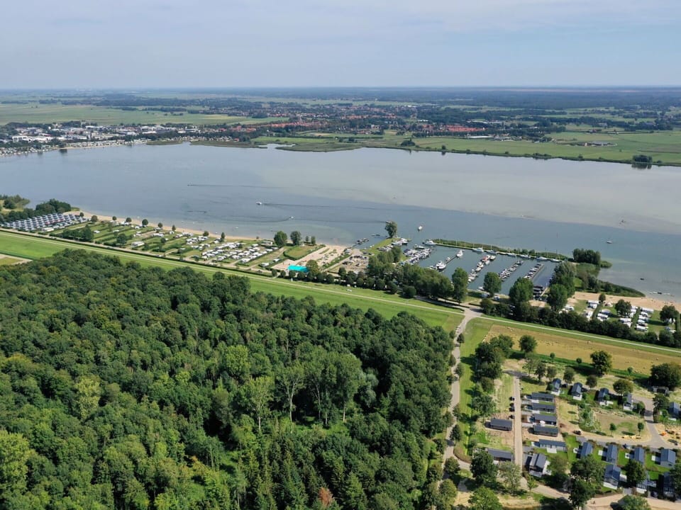 Water, Sky, Water Resources, Natural Landscape, Tree, Land Lot, Urban Design, Body Of Water, Coastal And Oceanic Landforms, Lake