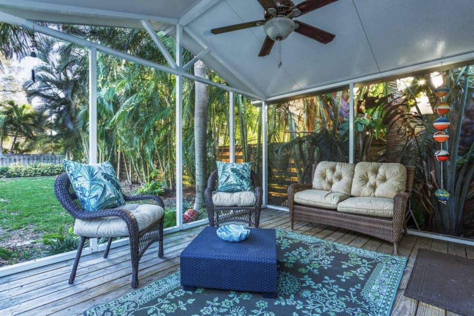 Relax and enjoy the backyard cabana/reading room.  It's screened and detached from the home.