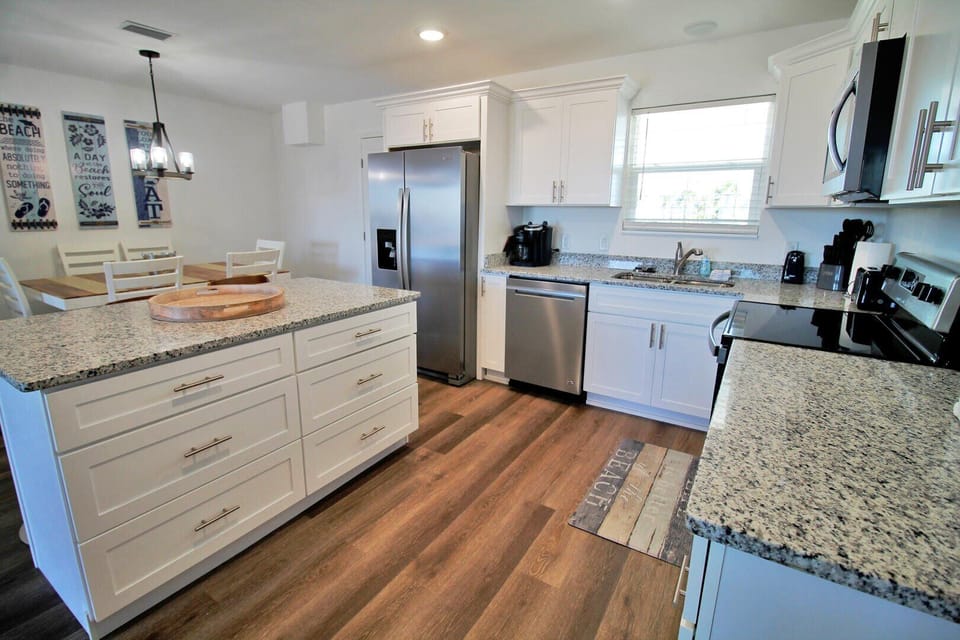 The well equipped kitchen is perfect for preparing the daily catch or grabbing a quick bite.
