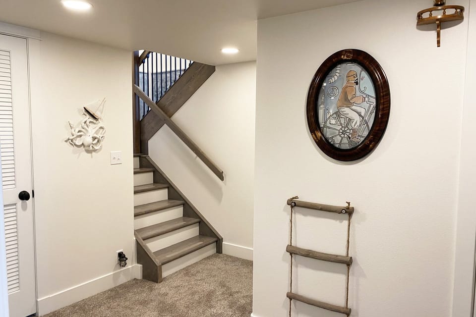 Lower floor with two queen bedrooms and full bath