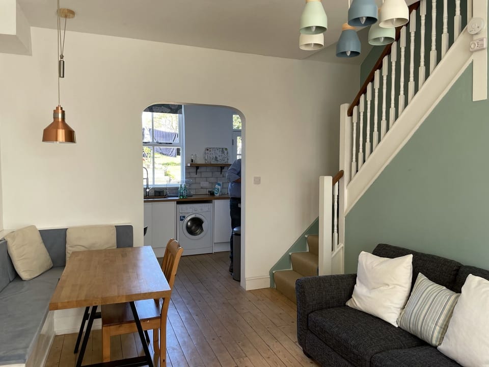 Living room, stairs up to bedrooms and bathroom 
