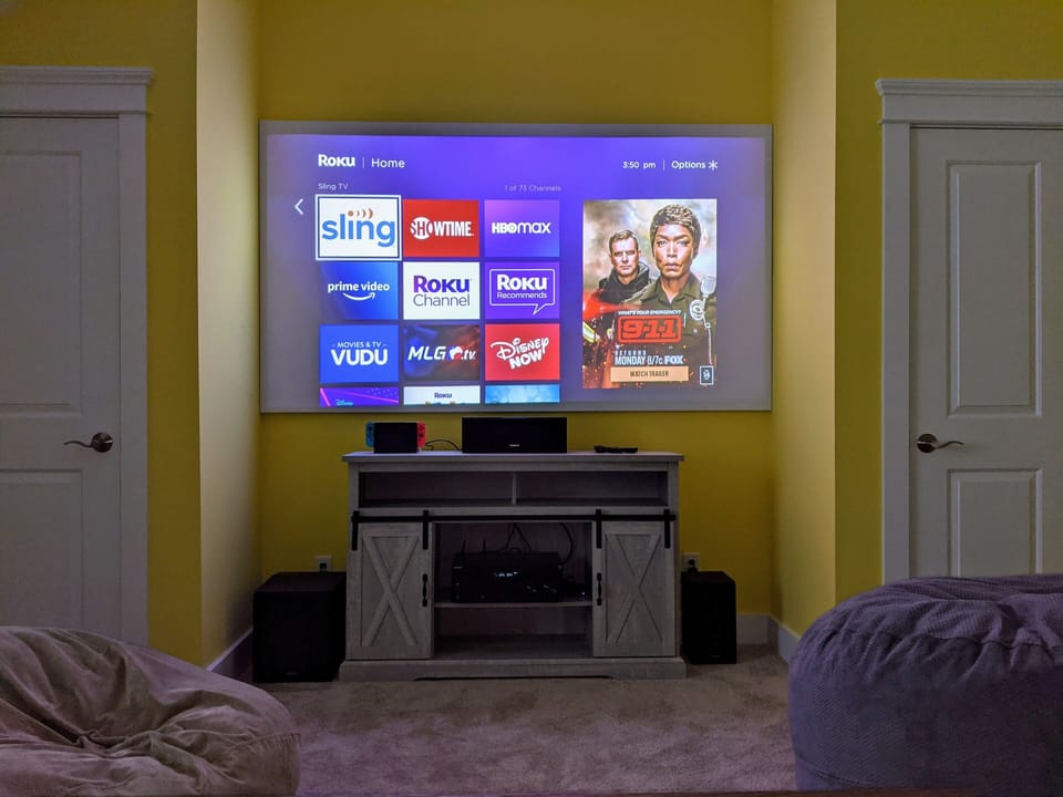 4th floor game room 100" projector screen with Roku, Nintendo Switch, DVD player