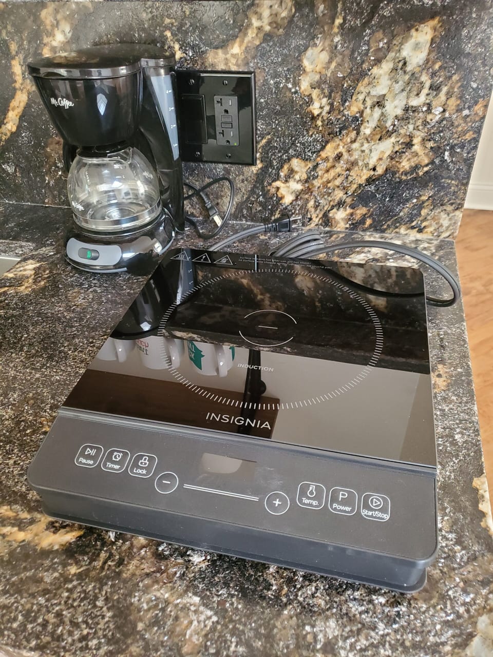 Induction cooktop and coffee maker.