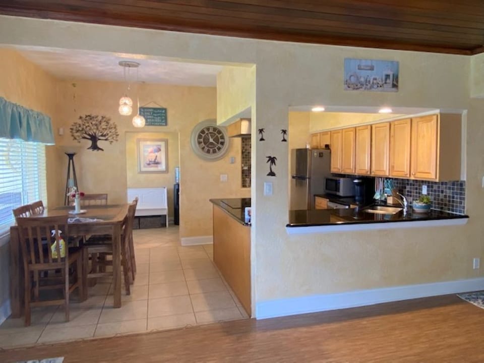 Open concept living, dining, kitchen area.