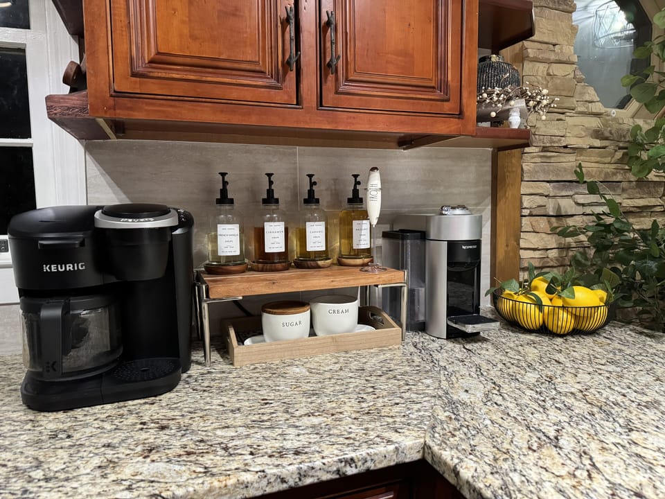 Coffee bar with Keurig and Nespresso machines. Complimentary pods for both.