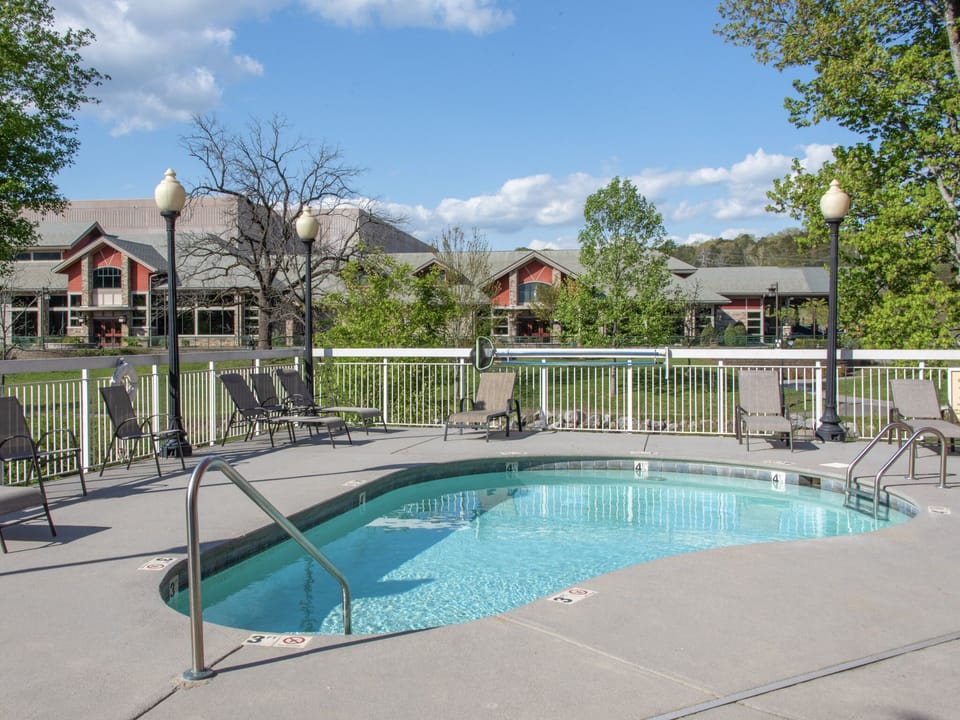 Relax Poolside - Settle in one of the lounge chairs with a drink and a magazine, and when you get hot, just jump in!
