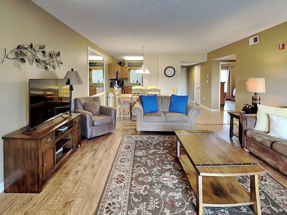 Living Room - Balcony Access, Fireplace, Mountain Views, Sleeper Sofa + TV