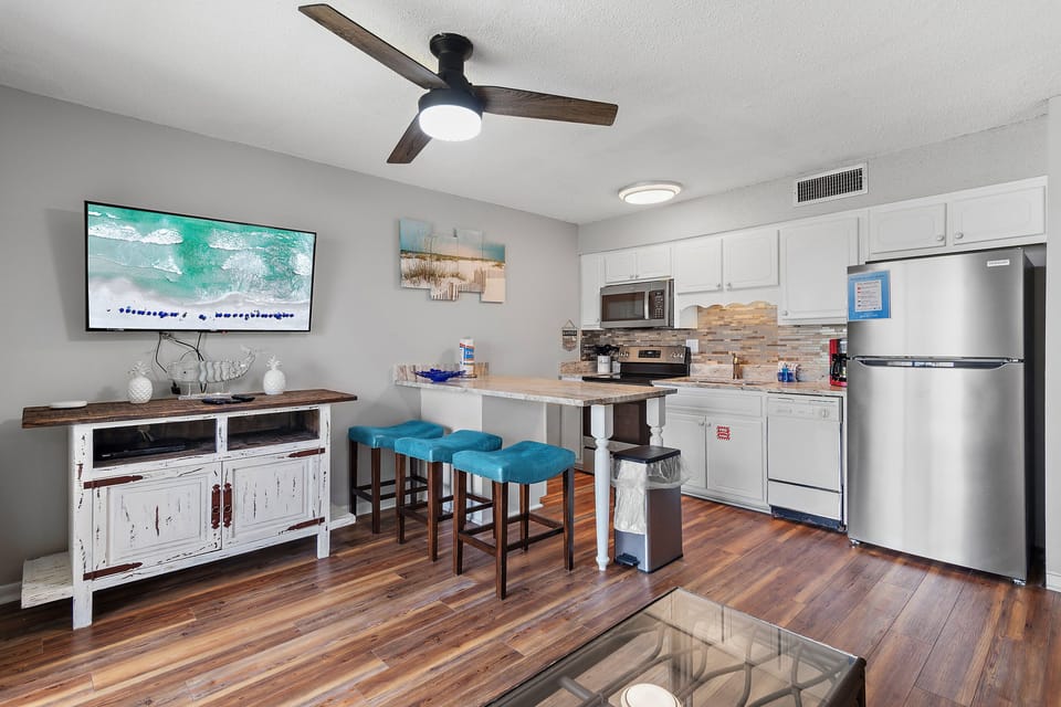 Fully equipped kitchen area with drip coffee maker 
