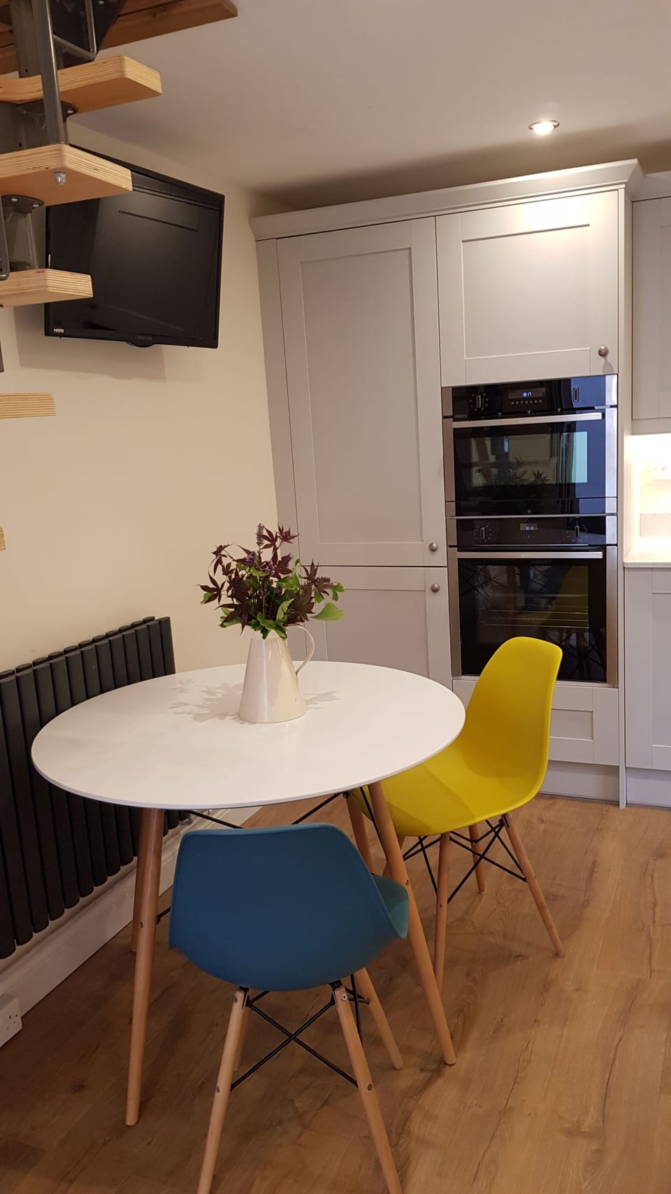 Dining area.  There are now tub chairs so more comfortable downstairs if kids up