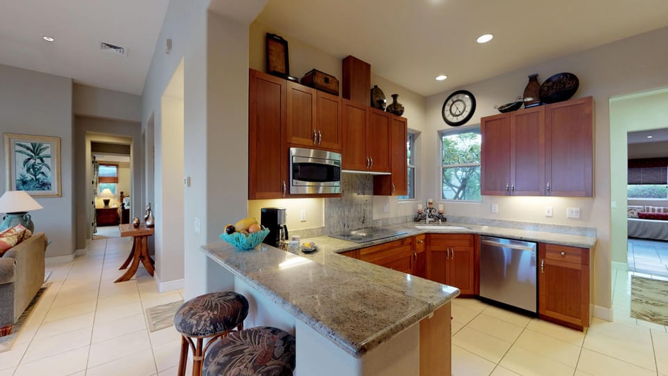 New cabinets with upgraded granite counter tops off of family room