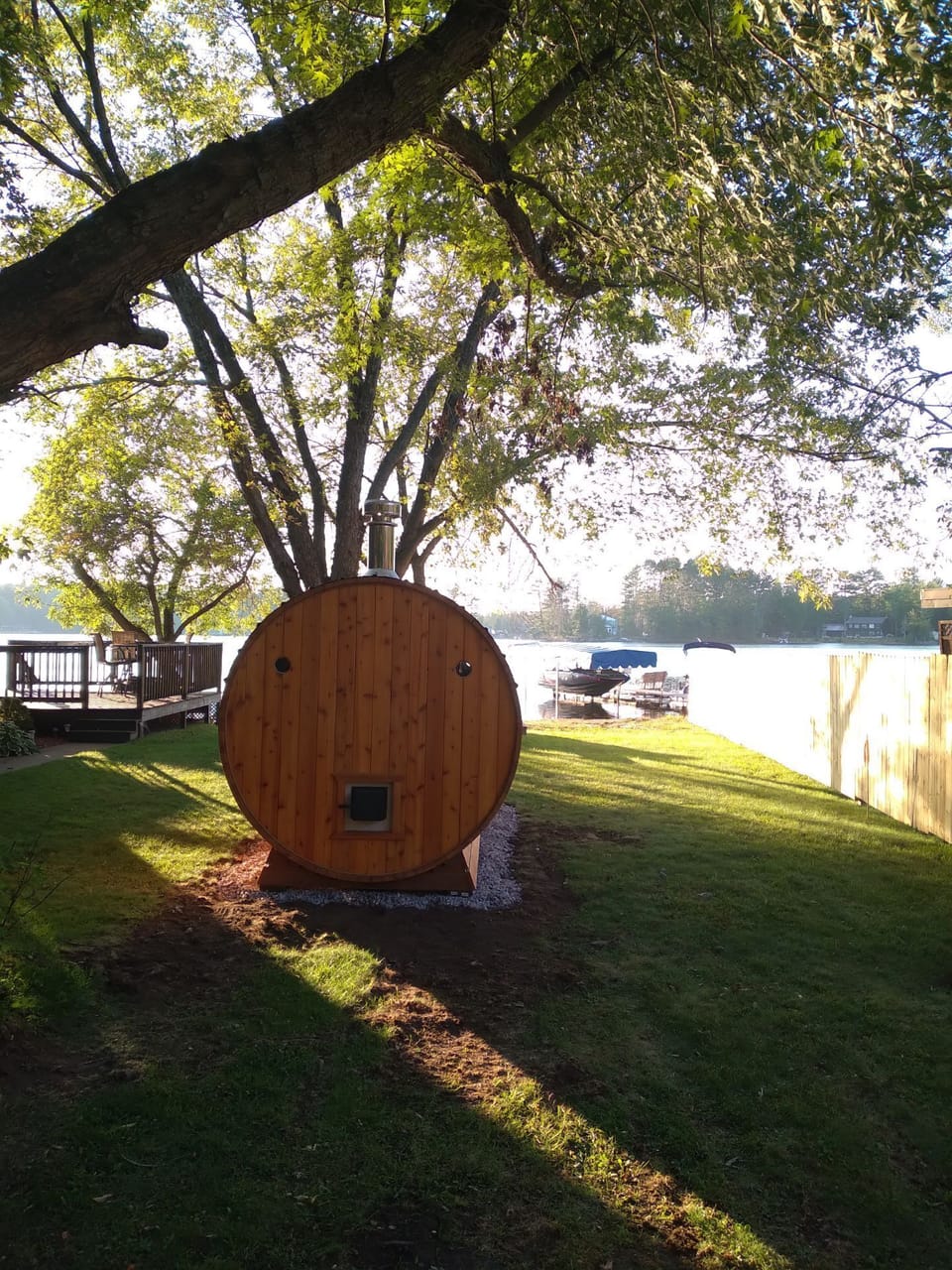 Wood fired fed stove from outside rear of sauna.