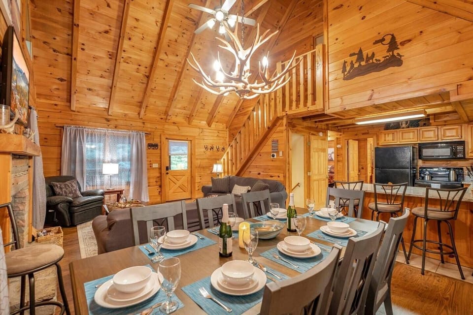 Experience the joy of family gatherings and shared dinners in our entire cabin home, exclusively for you to enjoy.