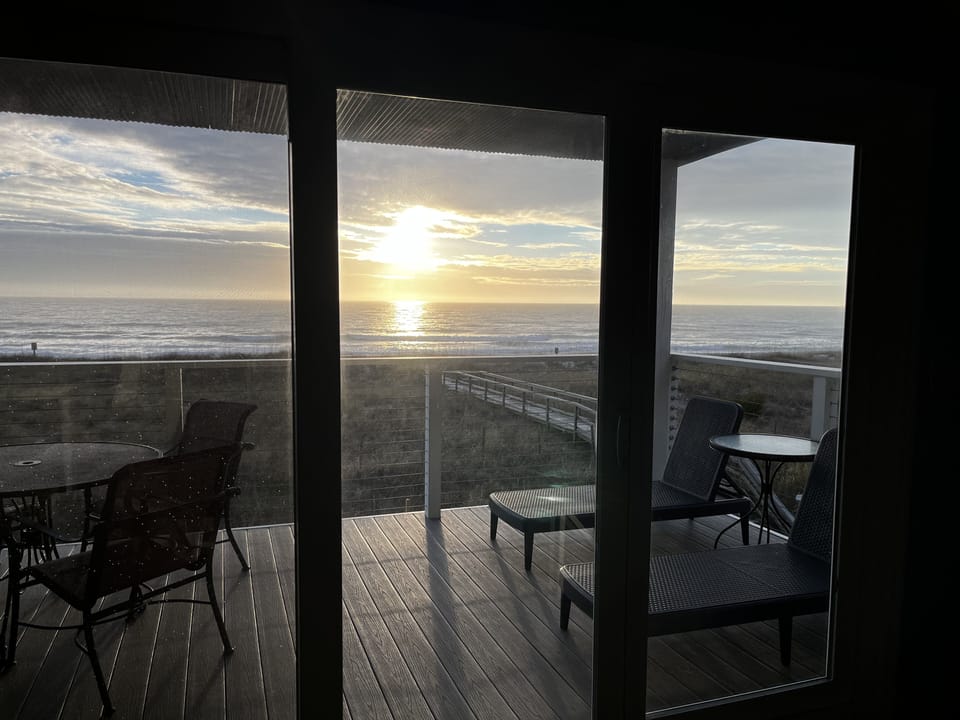 Catch the sunrise from inside through new patio doors.