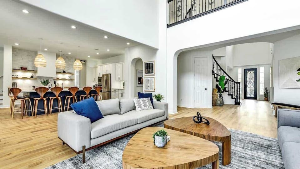 The living room opens to the kitchen which makes entertaining a breeze!