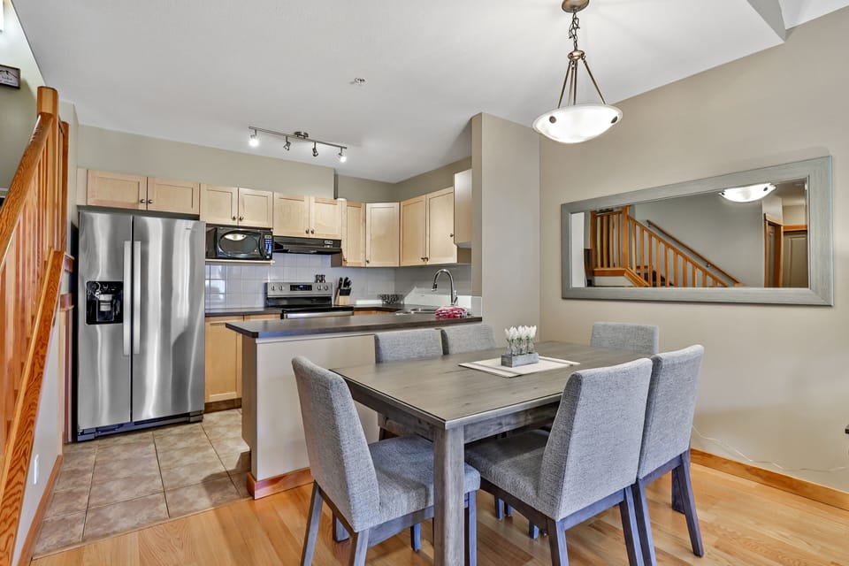 Enjoy dinner for up to 6 at the table and comfy chairs.